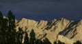 Trees blowing dusty mountains Video