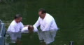 Baptism of pilgrims in the Jordan River Holy Land Israel HD