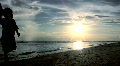 Family Walk on Beach at Sunset 1