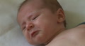 Newborn baby unhappy and crying