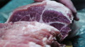 Cutting fresh meat to slices