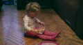 The little girl and a doll with a toy bed Video