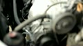 Pulley in car engine spinning rack focus