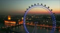 London Eye and Houses of Parliament in London at dusk