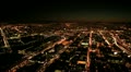Aerial night illuminated cityscape view of rolling city streets, San Francisco,