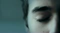 Closeup of young male eye. Horror look