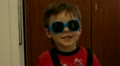 happy and smiling child wearing sunglasses