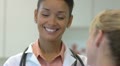 Female doctor talking with patient