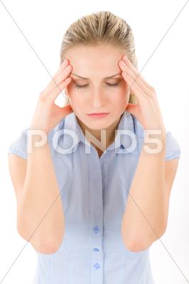 Stock photo of young woman with headache, migraine
