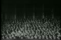 Audience in theater applauding