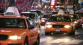 Car traffic at night Times Square New York City yellow cabs neon 30p