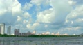 river with clouds and buildings. Time lapse Video