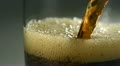 Pouring coke into glass, Slow Motion