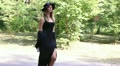 The young sexy girl in a black dress Video
