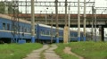 Old railway train going under the bridge Video
