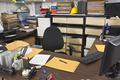 messy work room office desk