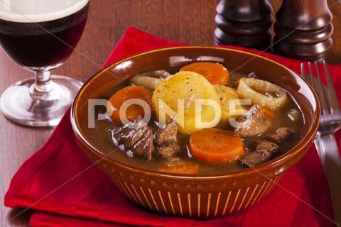 Irish Stew And A Glass Of Stout Stock Photo