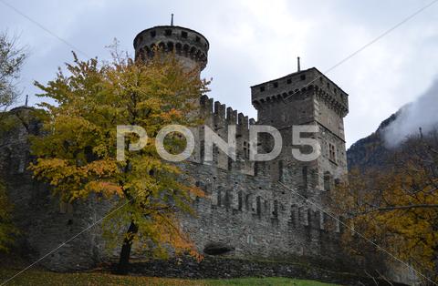 Stock photo of fenis castle in a cloudy day