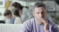 A man is concerned and stressed about life