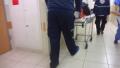paramedics entering patient to hospital emergency room