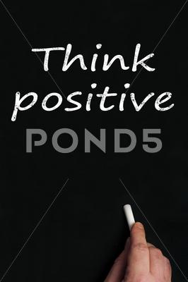 Stock Illustration of think positive on black board