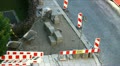 Ultra HD 4K Construction asphalt between cobbles stone pavement