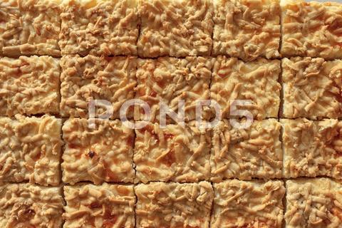 Stock photo of cheesecake cut into portions