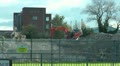 Demolishing Tower Block Digger On Rubble
