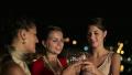 Happy girlfriends raising toast on party, steadicam shot HD