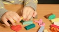 little girl play with plasticine