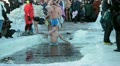 Adults in ice-hole dipping three times in Epiphany, Russia Video