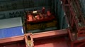 Maersk container coming out of ship hold
