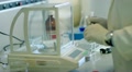bio chemist weighing chemical compound Video