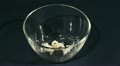 Popcorn falls in a glass cup. Close up scene Video