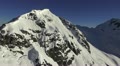 close aerial snow covered mountain peak