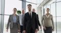 Attractive diverse business team in a light modern office building