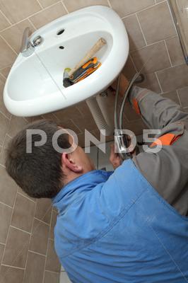Stock photo of plumber work