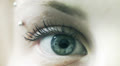 close-up of female eye looks around - move - open - close - macro Video