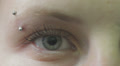 macro of female blue eye with piercing - macro Video