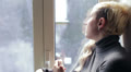 thoughtful woman waiting for a call Video