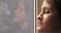 Pensive woman answers the phone Video