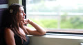 Young woman traveling by train