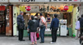 People looking at shopwindow in Nakamise-dori, Senso-ji shrine, Tokyo, Japan Video