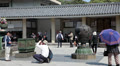 Japanese people photographing near incense burner against Great Buddha Video