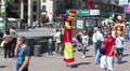 Clowns on stilts. Editorial. Video