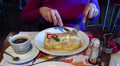 Woman in cafe. Part of a body. Video