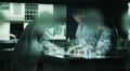 Multi ethnic medical research team working in the lab