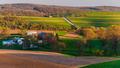 houses, roads, farm fields and rolling hills of southern york county, pennsyl