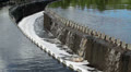 Round settler with overflowing sludge water Video