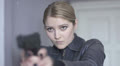 women officer shooting gun slow motion